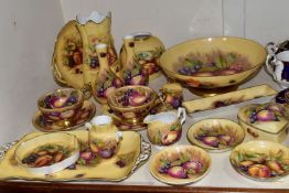 TWENTY PIECES OF AYNSLEY ORCHARD GOLD TEA AND GIFT WARES, comprising two cabinet teacups and