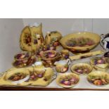 TWENTY PIECES OF AYNSLEY ORCHARD GOLD TEA AND GIFT WARES, comprising two cabinet teacups and