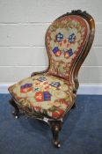 A VICTORIAN WALNUT SPOONBACK CHAIR, with a coat of arms fabric to back and seat (condition:-good