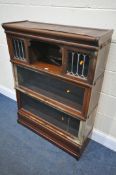 AN EARLY 20TH CENTURY GLOBE WERNICKE THREE SECTION BOOKCASE, one section with double glazed doors