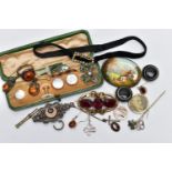 AN ASSORTMENT OF JEWELLERY, to include a late 19th century silver brooch detailed with a rose