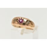 AN EARLY 20TH CENTURY 9CT YELLOW GOLD SAPPHIRE AND DIAMOND THREE STONE RING, the pink sapphire and