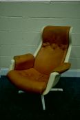 A 1970'S CREAM PERSPEX GALAXY LOUNGE CHAIR, with brown leatherette fabric, designed by Alf