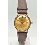 A GENTS 'TISSOT' WRISTWATCH, automatic movement, round gold dial signed 'Tissot Swiss, Automatic