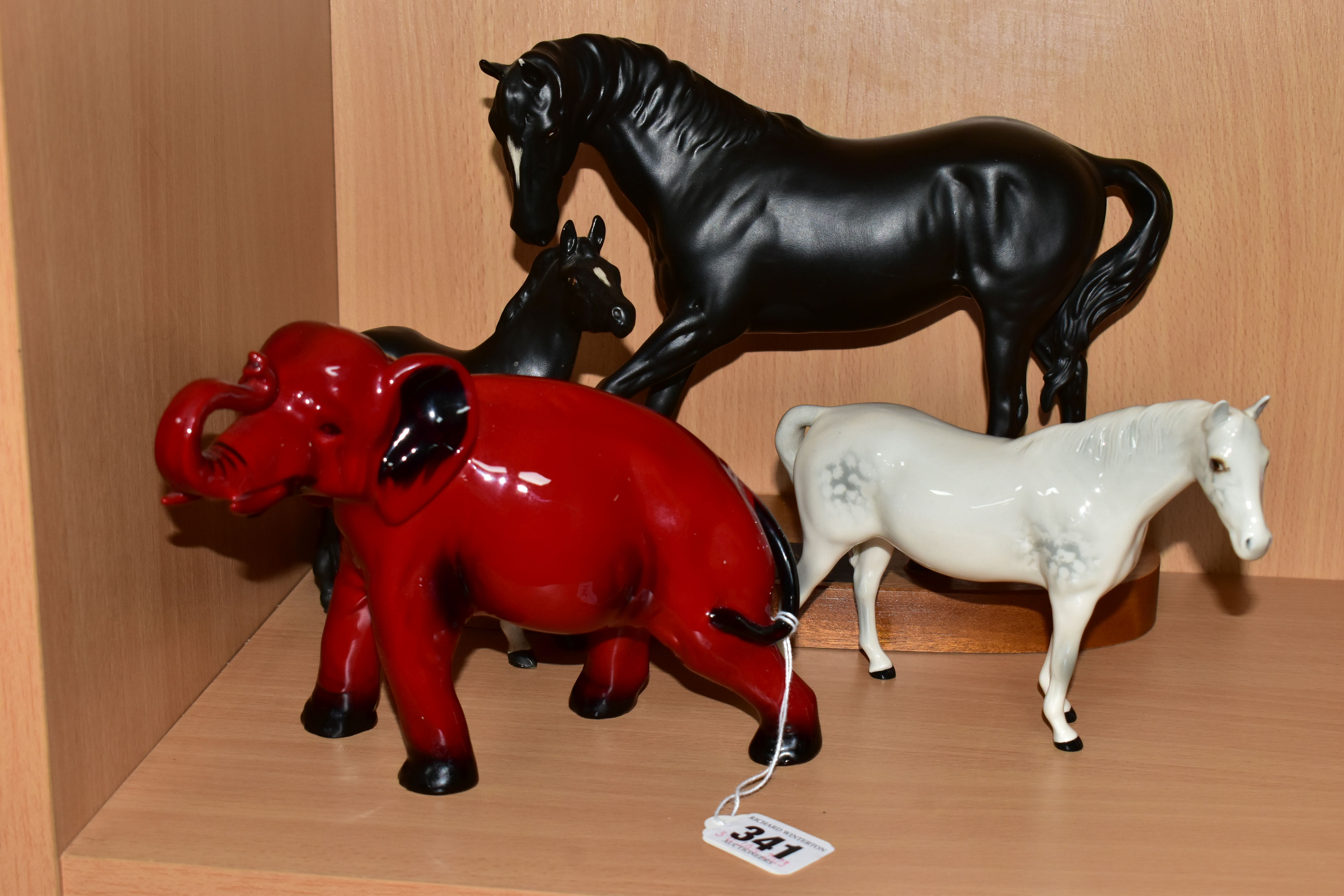 A ROYAL DOULTON FLAMBÉ ELEPHANT FIGURE TOGETHER WITH TWO BESWICK HORSE FIGURES, the elephant
