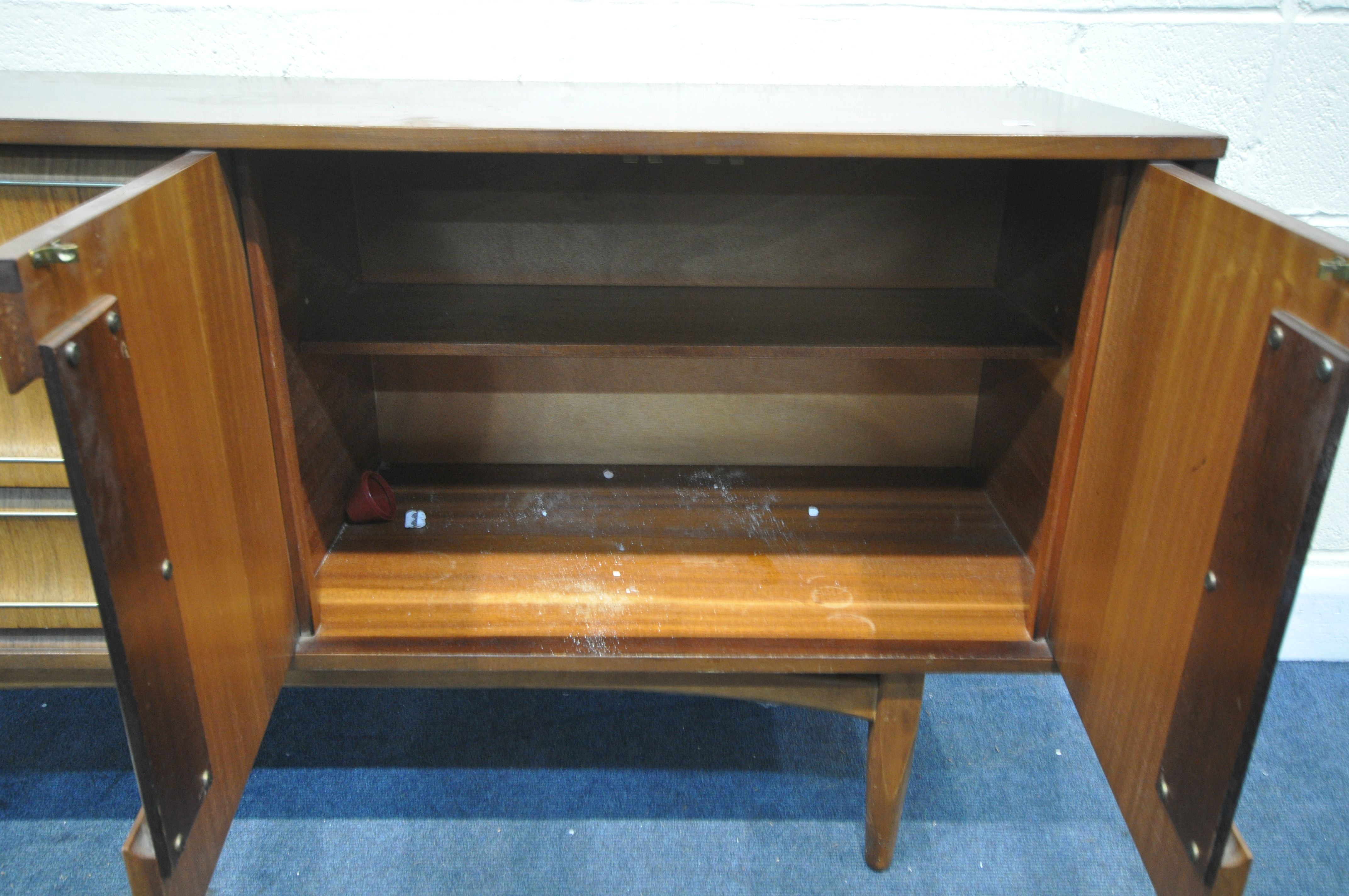 A MID CENTURY TEAK SIDEBOARD, with three drawers, and two cupboard doors, length 152cm x depth - Image 4 of 4