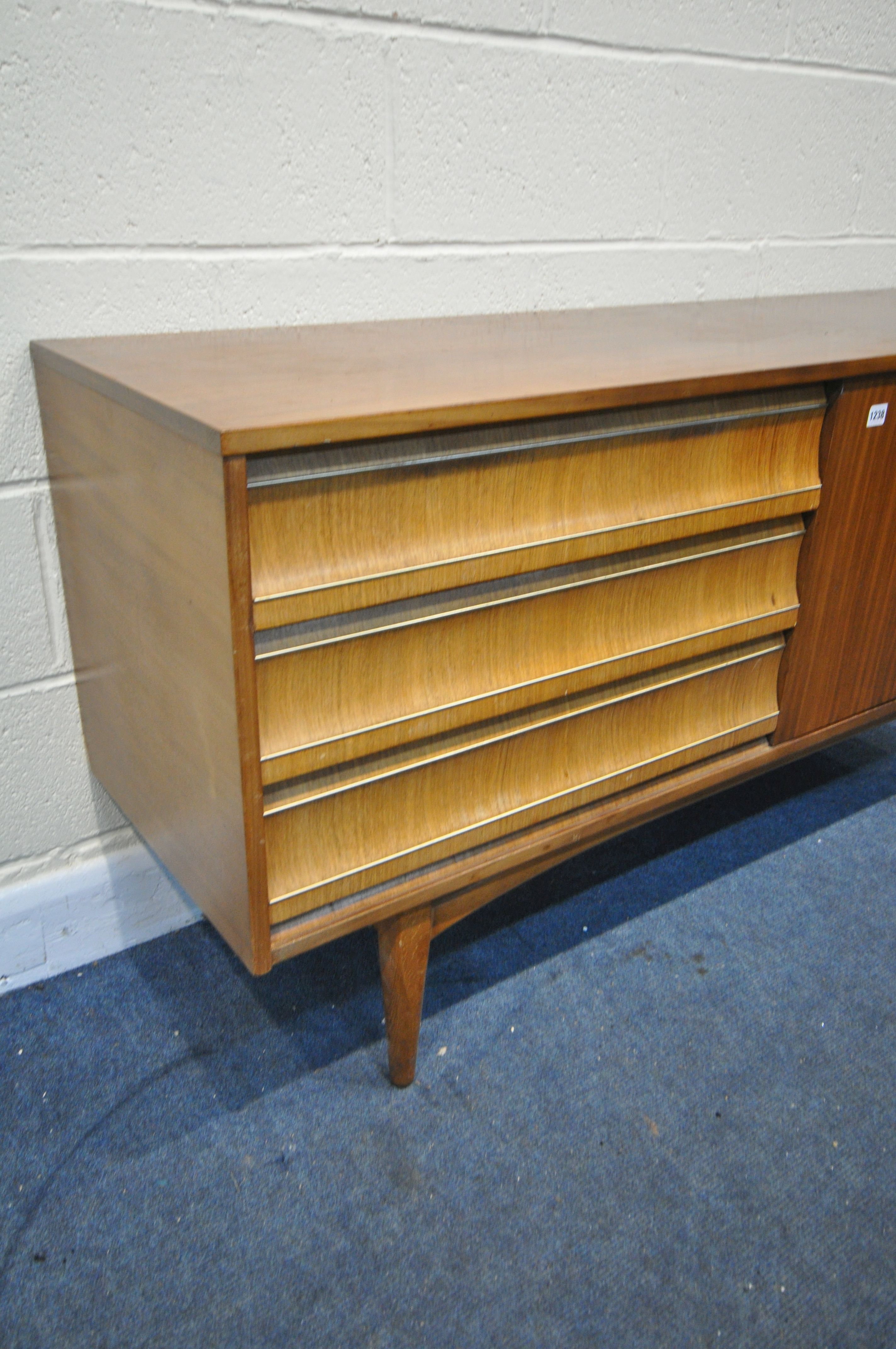 A MID CENTURY TEAK SIDEBOARD, with three drawers, and two cupboard doors, length 152cm x depth - Image 2 of 4