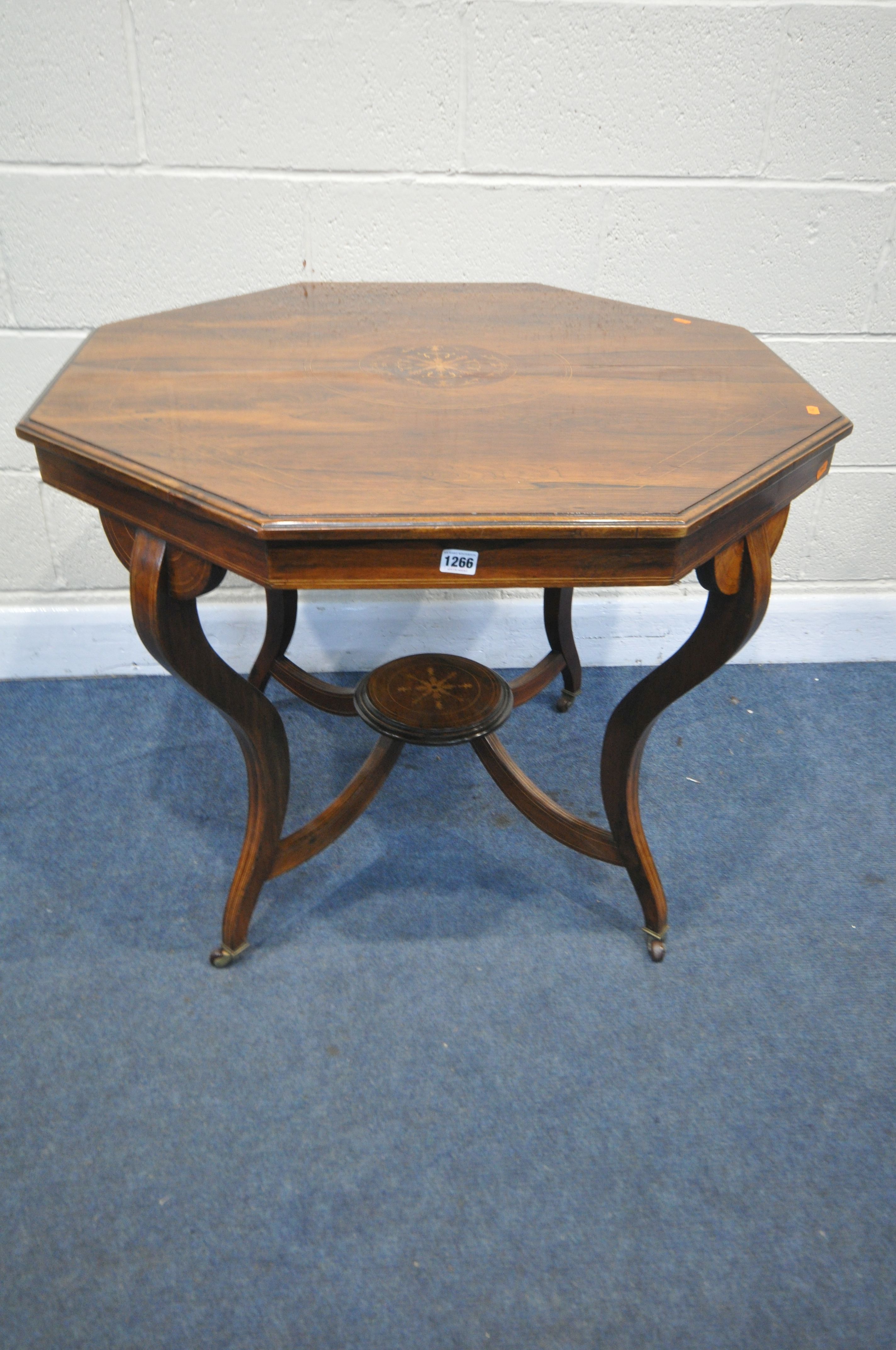 A 19TH CENTURY ROSEWOOD AND MARQUETRY INLAID OCTAGONAL CENTRE TABLE, on four shaped legs, united