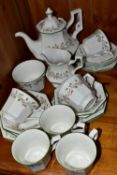 A TWENTY ONE PIECE JOHNSON BROTHERS ETERNAL BEAU TEA SET, comprising a teapot, milk jug, sugar bowl,