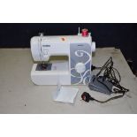 A BROTHER AE1700 MODERN SEWING MACHINE with bobbins, power and treadle cable (PAT pass and working)