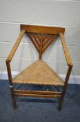 A 20TH CENTURY MAHOGANY TURNERS CHAIR, with a rush seat, width 55cm x depth 46cm x height 84cm (
