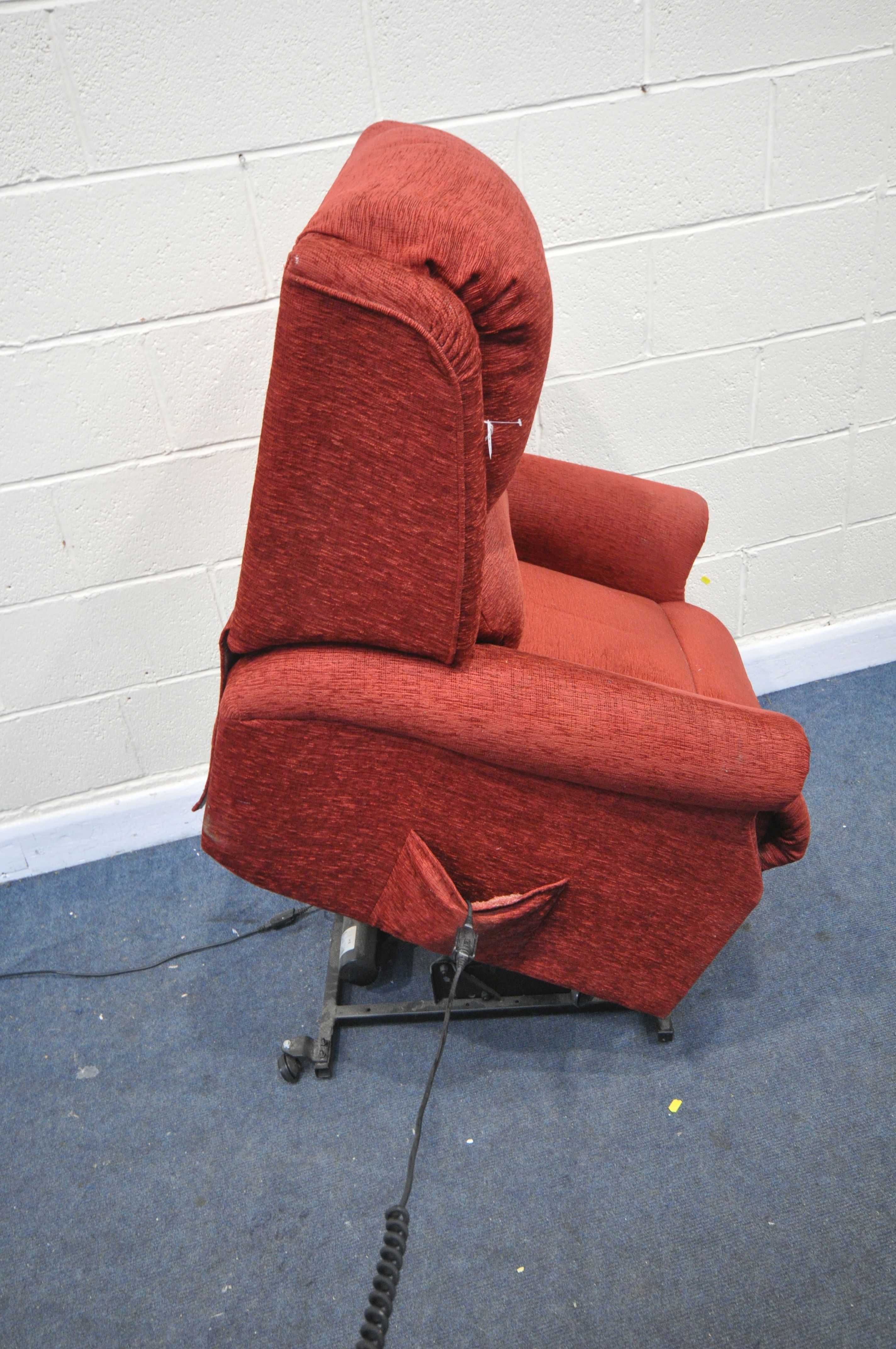 A CELEBRITY RED UPHOLSTERED ELECTRIC RISE AND RECLININER (PAT pass and working, condition:-fabric - Image 2 of 3