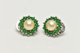A PAIR OF IMITATION PEARL AND PASTE EARRINGS, each ear clip set with an imitation pearl surrounded