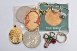 A BAG OF ASSORTED ITEMS, to include a silver gilt oval locket, decorated with a floral pattern to