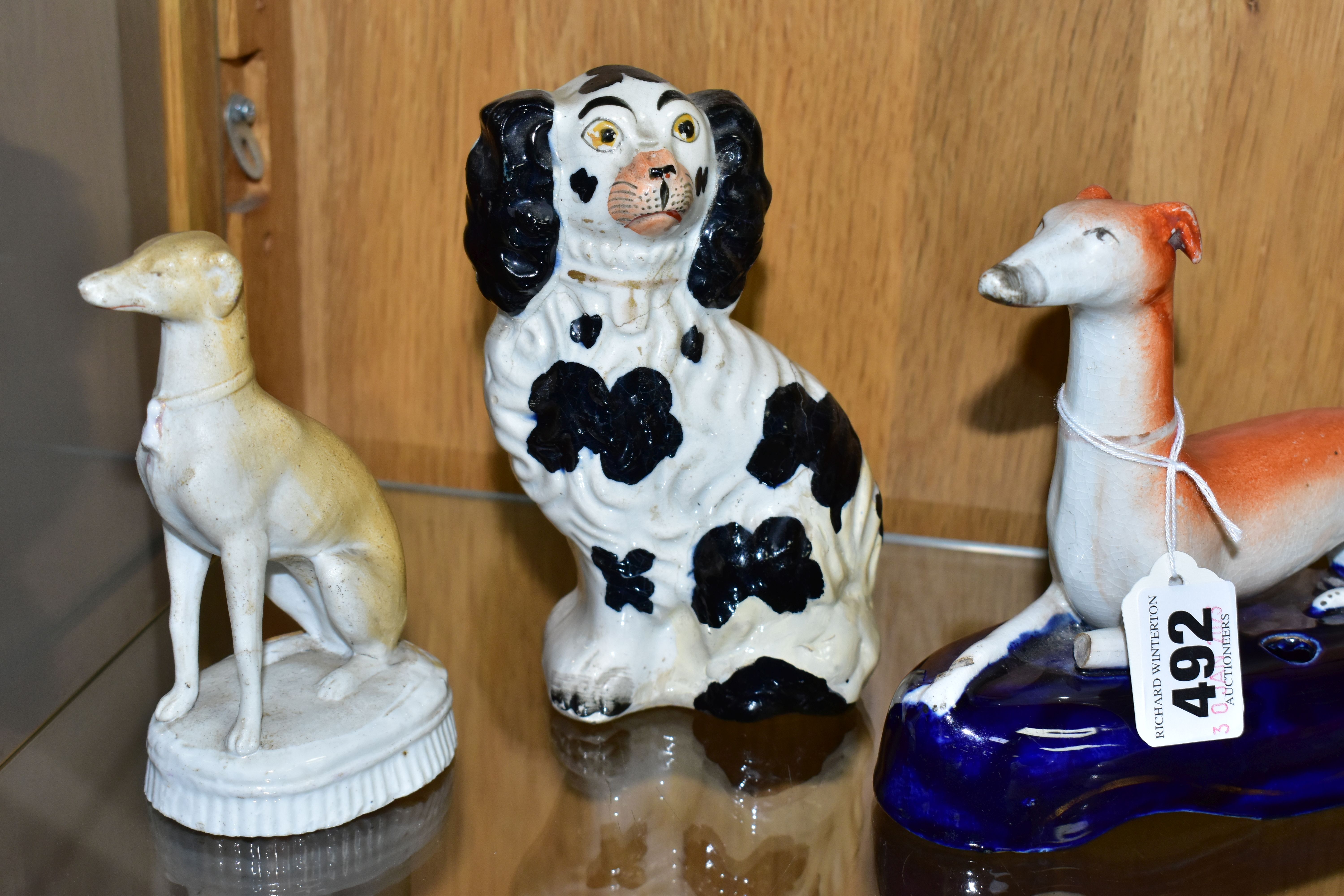 A GROUP OF LATE 19TH CENTURY STAFFORDSHIRE ANIMAL FIGURES, comprising a recumbent Greyhound pen - Image 3 of 7