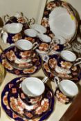 A TWENTY THREE PIECE ROYAL ALBERT 'HEIRLOOM' PATTERN TEA SET, comprising six cups (two have small