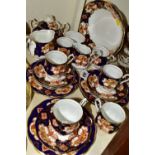 A TWENTY THREE PIECE ROYAL ALBERT 'HEIRLOOM' PATTERN TEA SET, comprising six cups (two have small