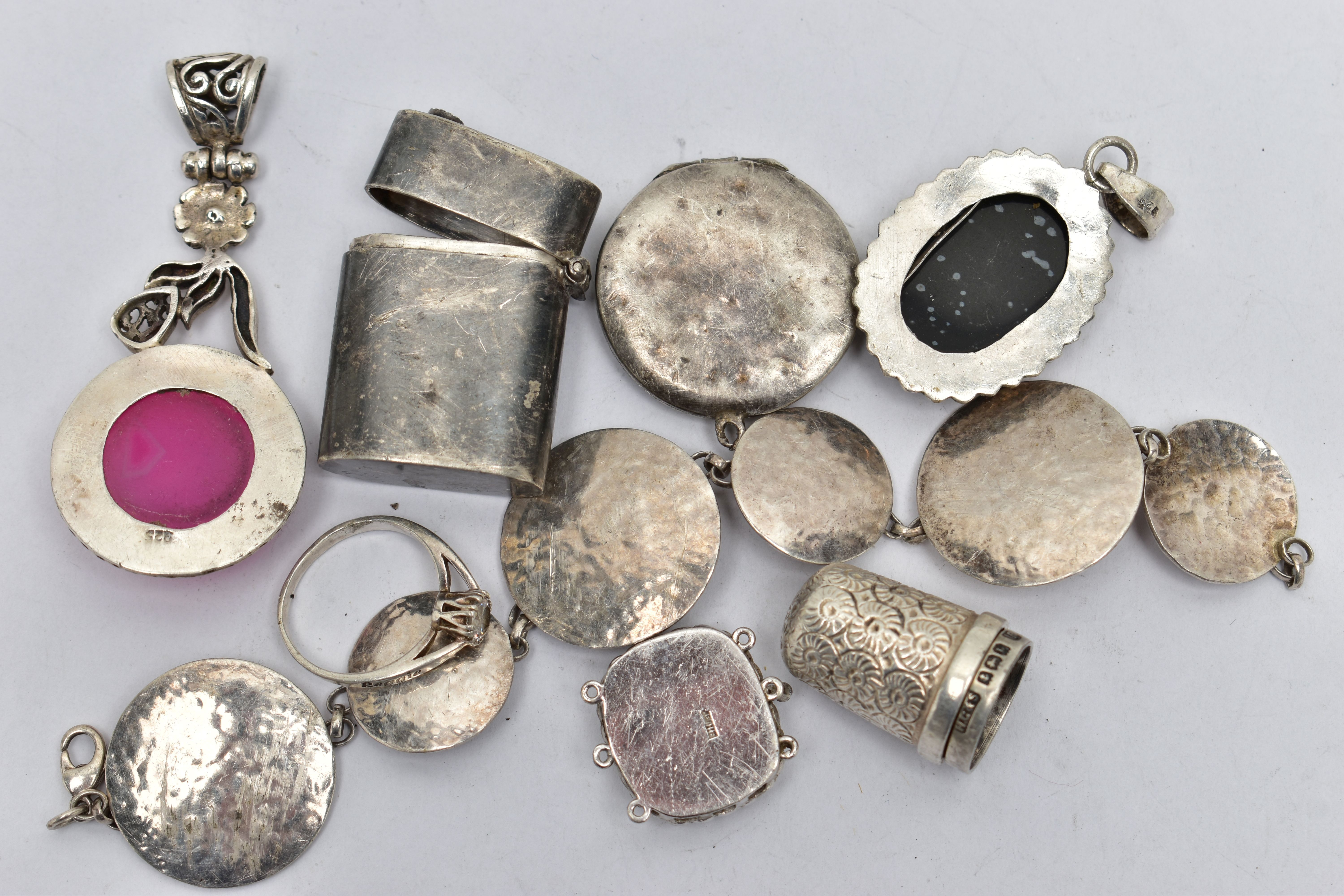 AN ASSORTMENT OF WHITE METAL JEWELLERY, to include two hardstone pendants, an enamel locket, two - Image 3 of 3