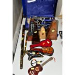 A FRENCH CLARINET, Cased Buffet Crampon & Co Paris B12 clarinet, together with three metronomes,