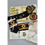 AN INTERESTING BOX OF NAVAL BULLION BADGES, to include shoulder epaulettes and insurance trade