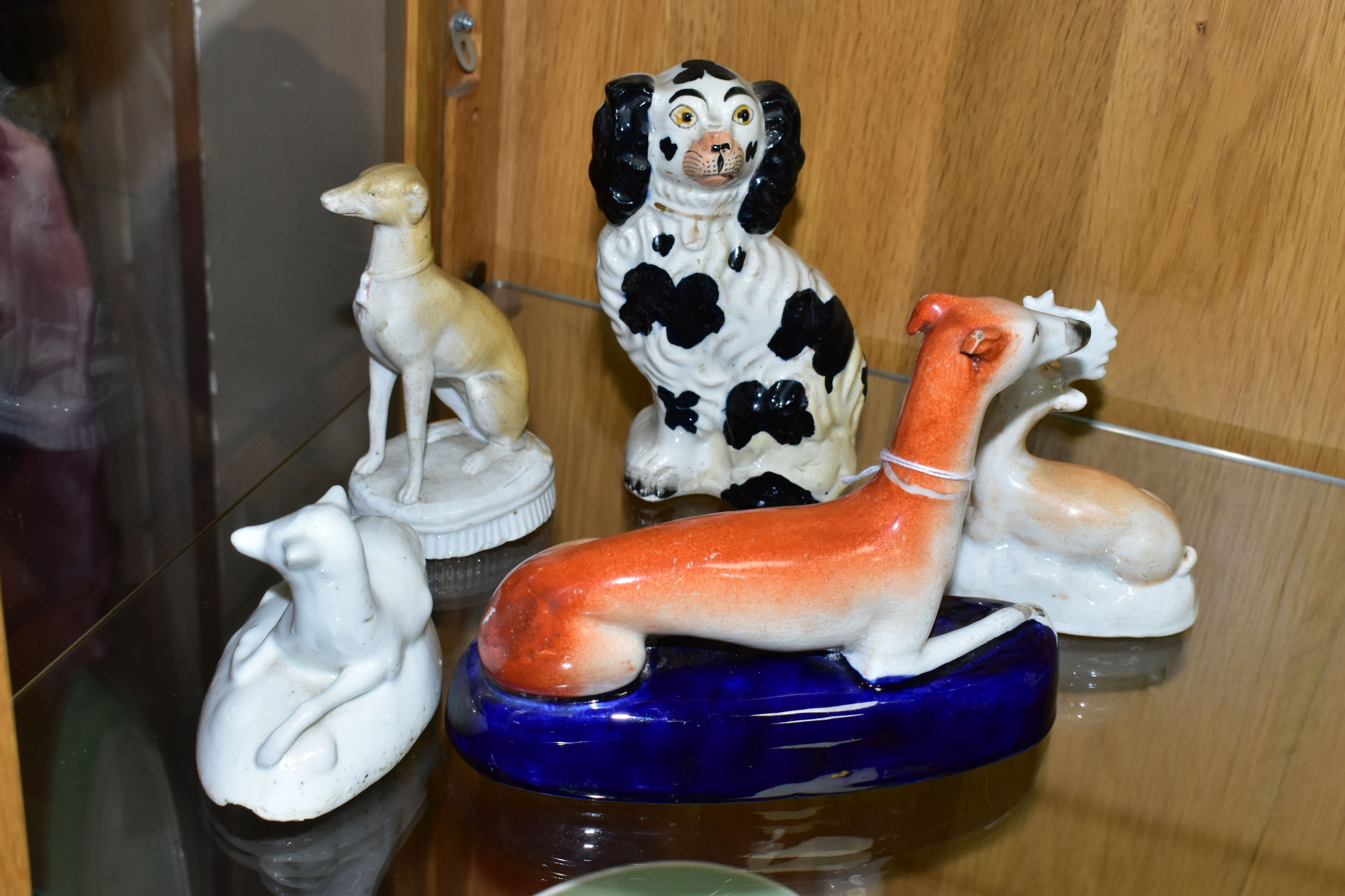 A GROUP OF LATE 19TH CENTURY STAFFORDSHIRE ANIMAL FIGURES, comprising a recumbent Greyhound pen - Image 5 of 7