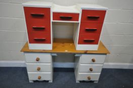 A PARTIALLY PAINTED PINE DESK, with two banks of three drawers, length 133cm x depth 45cm x height