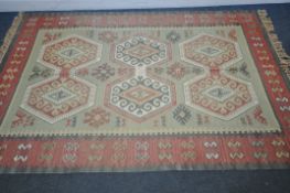 A 20TH CENTURY WOOLLEN MOROCCAN GEOMETRIC RUG, 240cm x 159cm, along with a modern blue rug, and a