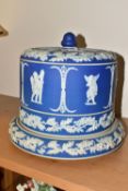 A WEDGWOOD JASPERWARE CHEESE DOME AND BASE, the mid-blue body decorated with figures of putti and