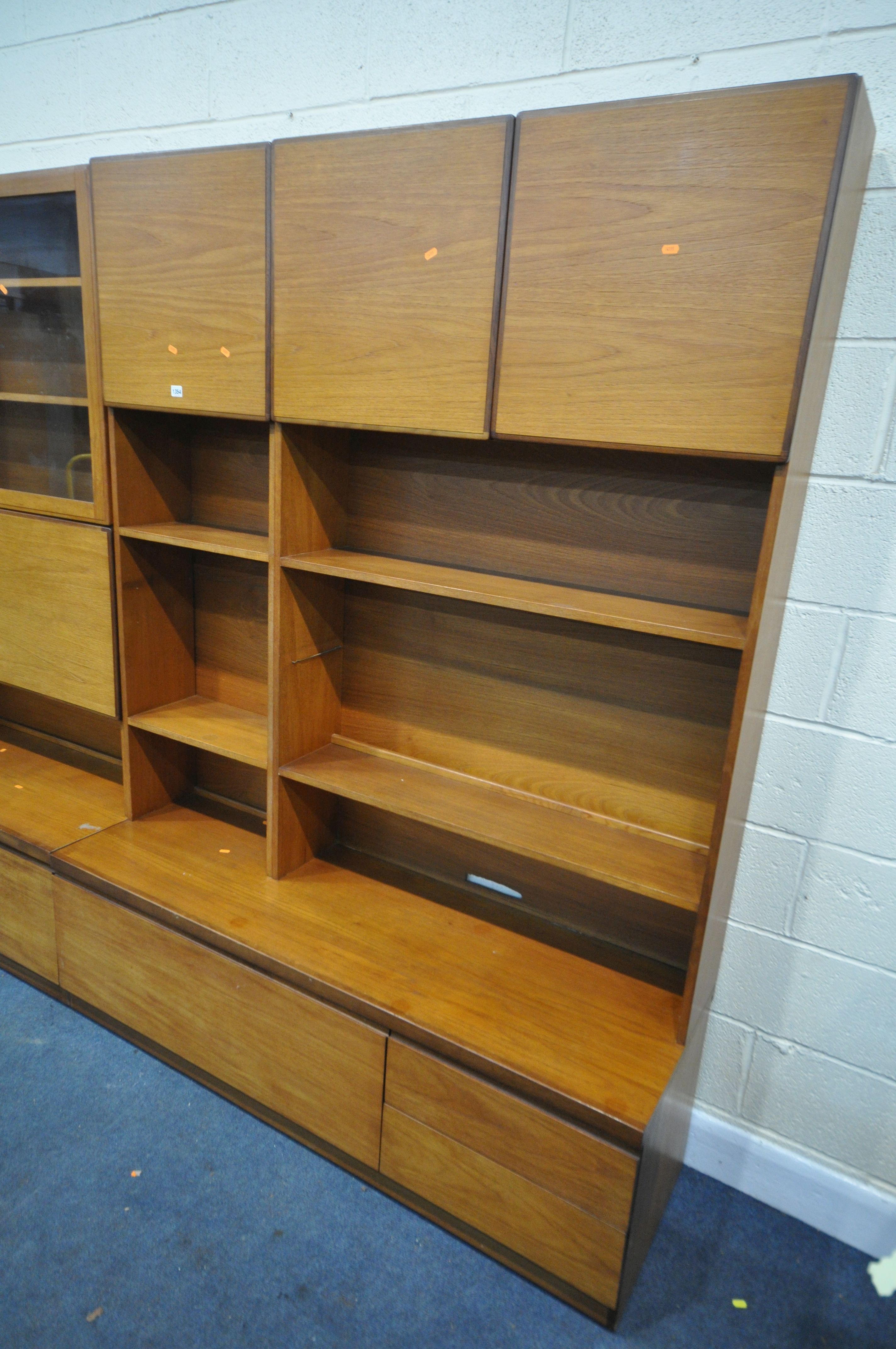 A MID CENTURY THREE SECTION TEAK WALL SHELVING UNIT, in two sections, including an arrangement of - Image 2 of 5