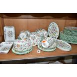 A SIXTY FOUR PIECE MINTON HADDON HALL DINNER SERVICE, comprising three oval serving plates (one with