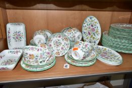 A SIXTY FOUR PIECE MINTON HADDON HALL DINNER SERVICE, comprising three oval serving plates (one with
