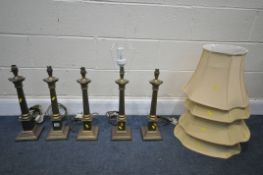A SET OF FIVE LAURA ASHLEY BRASS CORINTHIUM COLUMN TABLE LAMPS, made in Portugal, height to