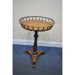 A VICTORIAN ROSEWOOD CIRCULAR TRIPOD TABLE, with a spindled gallery, on a nonagon shaped, triform