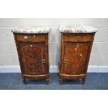 A PAIR OF LOUIS XV AMBOYNA BEDSIDE CABINETS, with a veined marble top, brass mounts, single