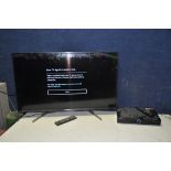 A SONY KD-43XH8196 43in TV with remote along with a Humax Freeview plus box with remote (both PAT