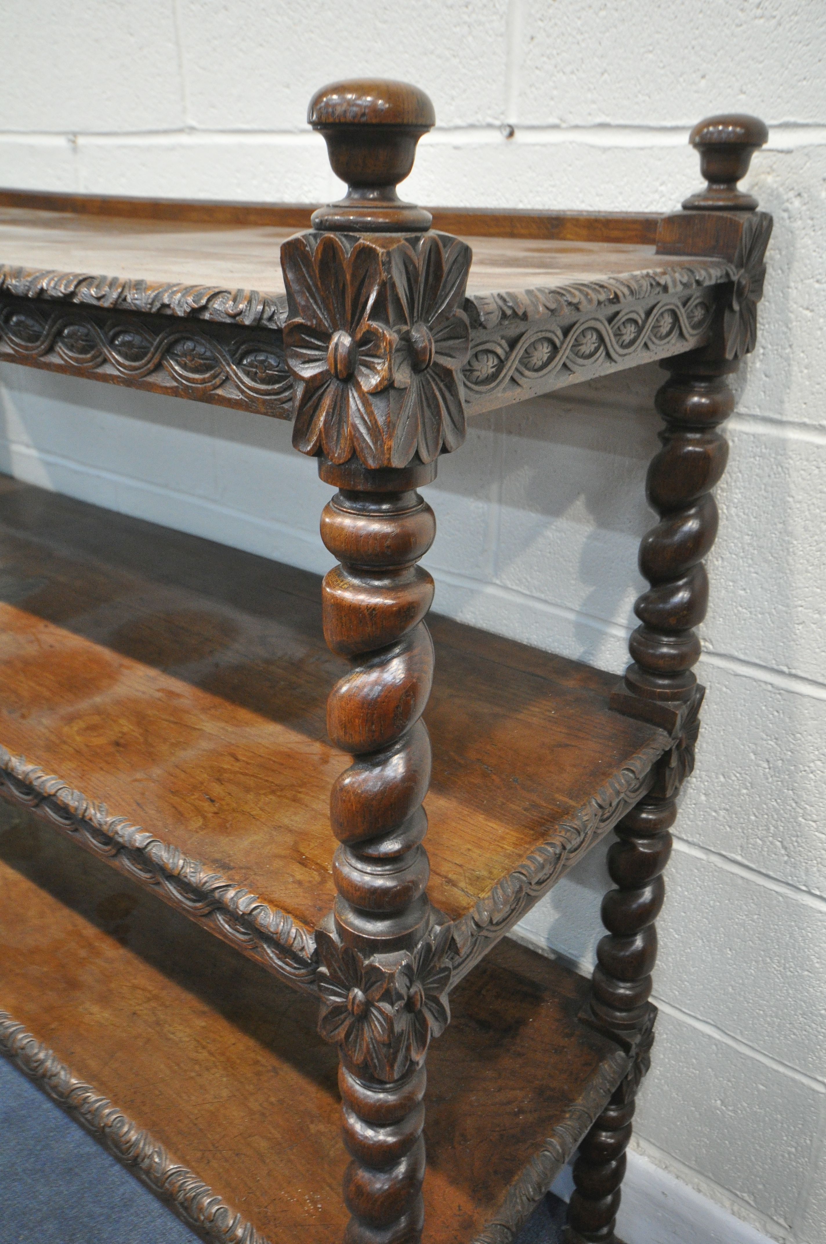 A LATE 19TH/EARLY 20TH CENTURY CARVED OAK THREE TIER BUFFET, on barley twist uprights, width 137cm x - Image 3 of 6