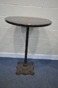 A HEAVY VICTORIAN CAST IRON POSEUR PUB TABLE, with a mahogany top, with a circular plaque, inscribed