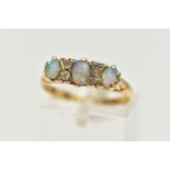 AN EARLY 20TH CENTURY 18CT GOLD, OPAL AND DIAMOND RING, designed with three oval opal cabochons,
