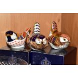 THREE ROYAL CROWN DERBY BIRD PAPERWEIGHTS, comprising a boxed Coal Tit, with gold stopper, red