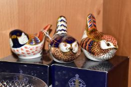 THREE ROYAL CROWN DERBY BIRD PAPERWEIGHTS, comprising a boxed Coal Tit, with gold stopper, red