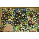 ONE TRAY OF 20TH CENTURY GLASS AND STEEL MARBLES, to include approximately sixty assorted marbles (