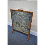 AN ORIENTAL HARDWOOD FIRESCREEN, with needle work landscape, width 65cm x height 86cm (condition -