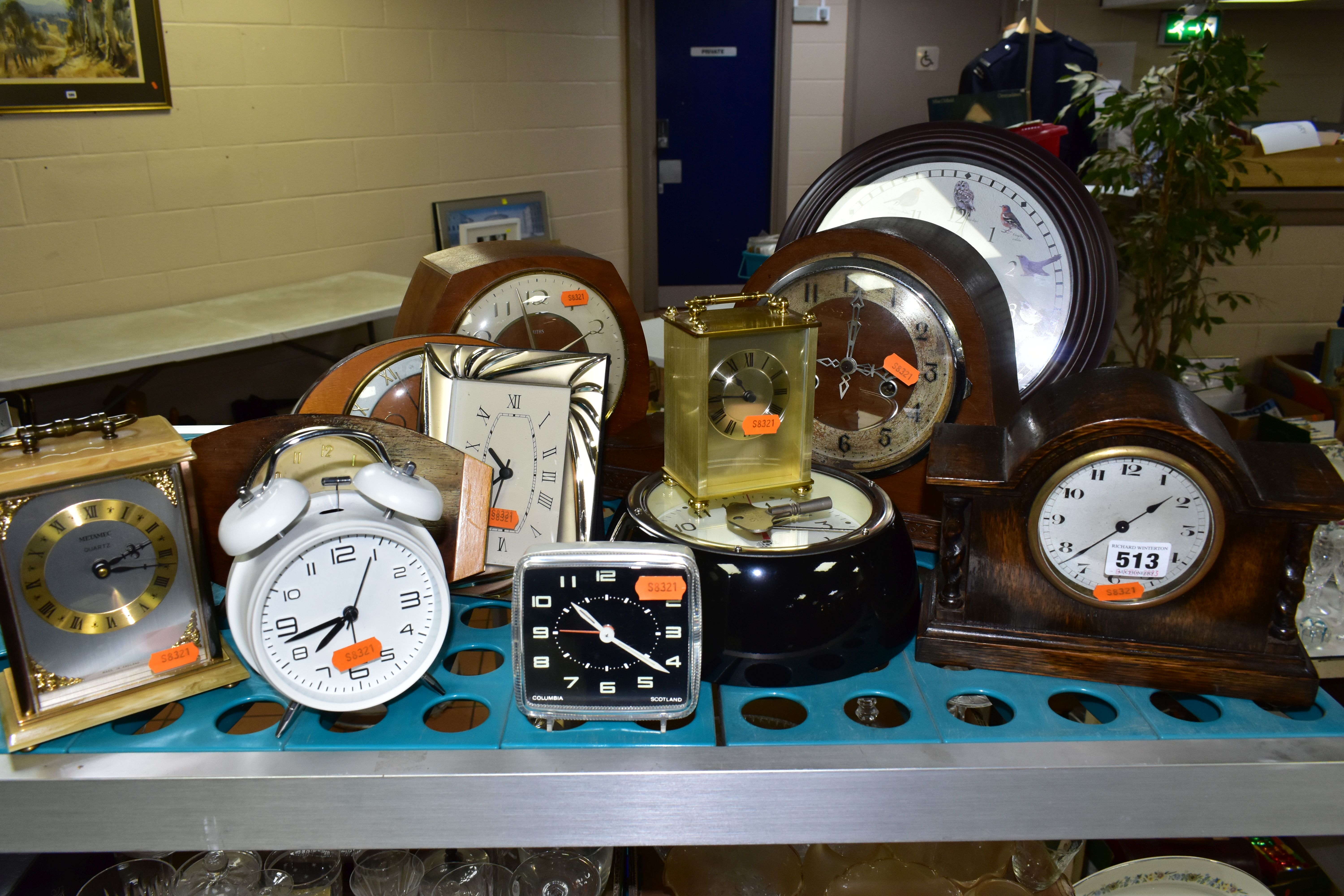 A GROUP OF CLOCKS, to include a Metamec carriage clock, a Westclox mid twentieth century table