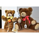 TWO STEIFF BEARS, comprising a boxed light brown bear 023132 with yellow ribbon, gold button, yellow