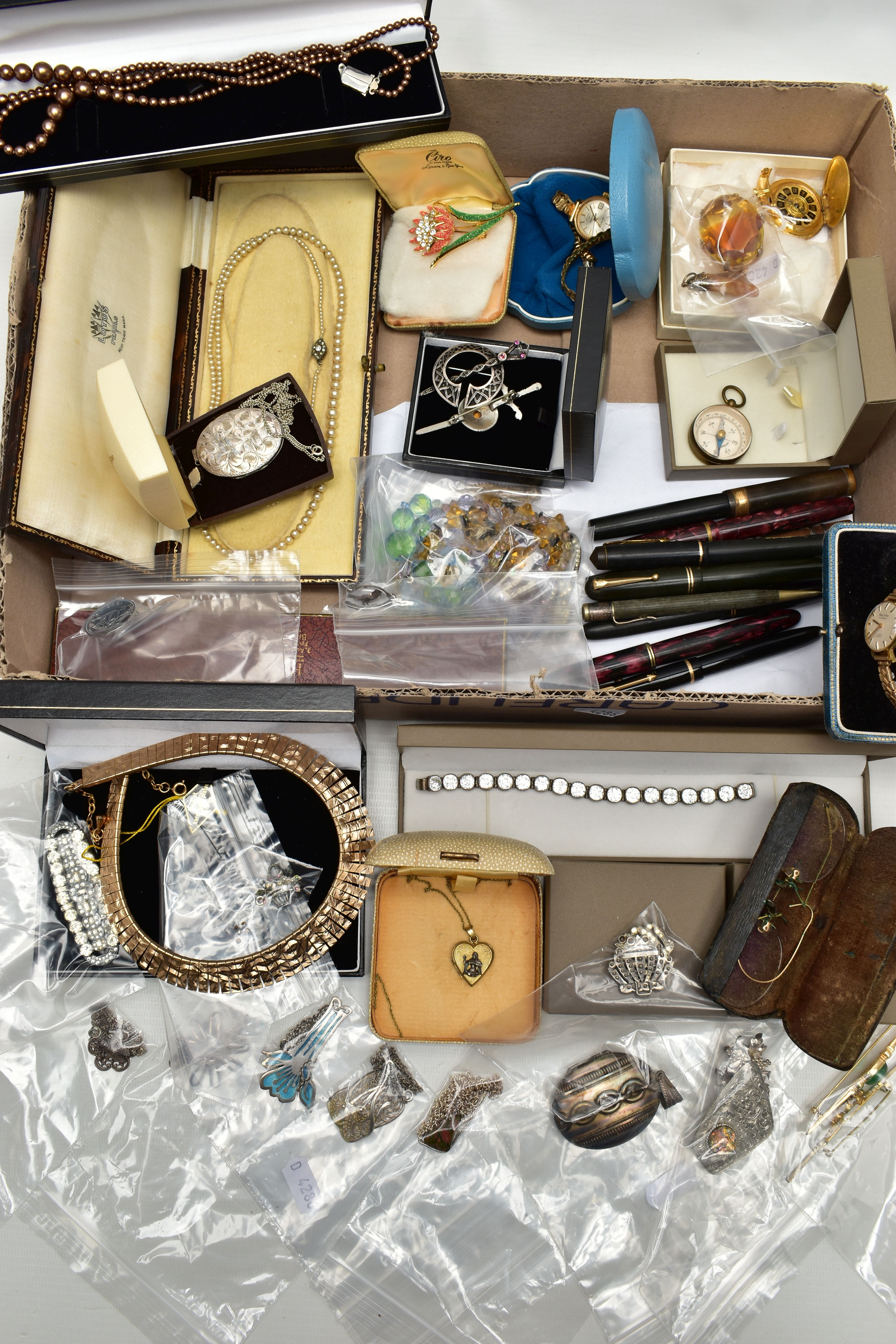 A BOX OF ASSORTED SILVER AND COSTUME JEWELLERY, to include a silver floral detailed oval locket,