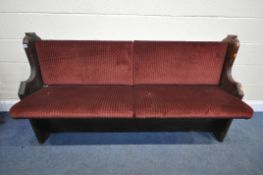 A 19TH CENTURY CHURCH PEW, with an upholstered seat, length 176cm (condition:-aged wear and tear)
