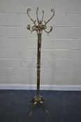A FRENCH BRASS AND ONYX HAT/COAT STAND, height 174cm (condition:-repair to top section of onyx)