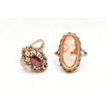 TWO 9CT GOLD RINGS, the first a marquise cut garnet set within an open work beaded mount with a high