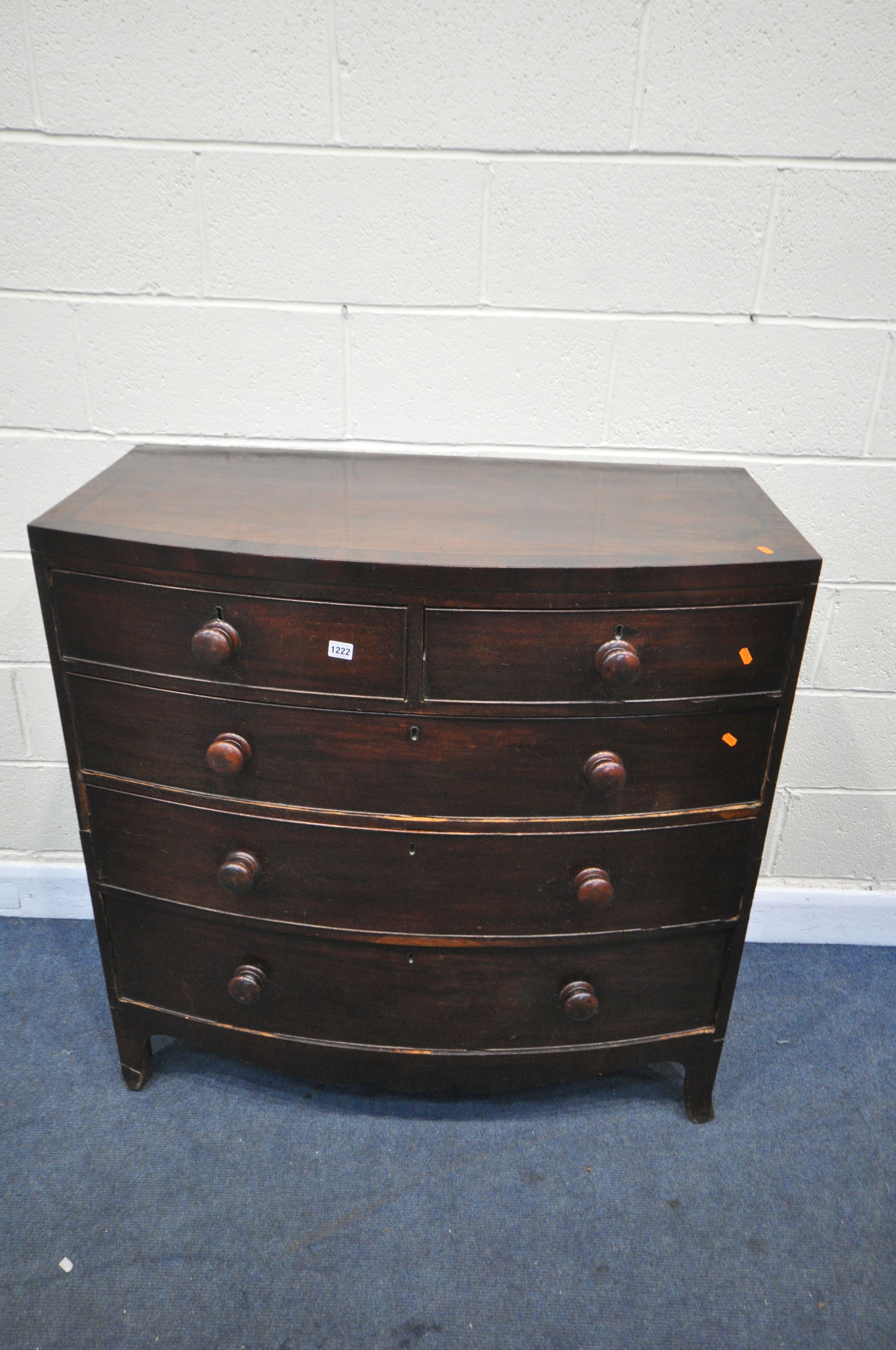 A GEORGIAN MAHOGANY BOWFRONT CHEST OF TWO SHORT OVER THREE LONG DRAWERS, with turned handles, on - Image 2 of 3