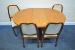 A MID-CENTURY NATHAN TEAK CIRCULAR EXTENDING DINING TABLE, with a single additional fold out leaf,